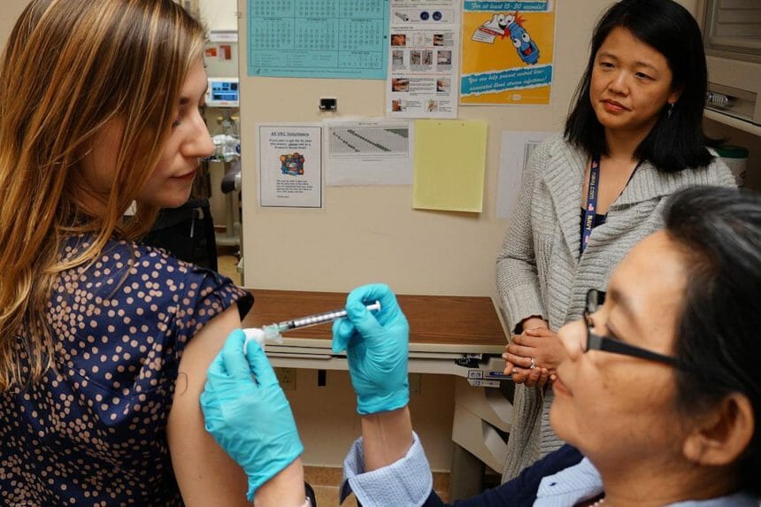 woman receiving flu shot