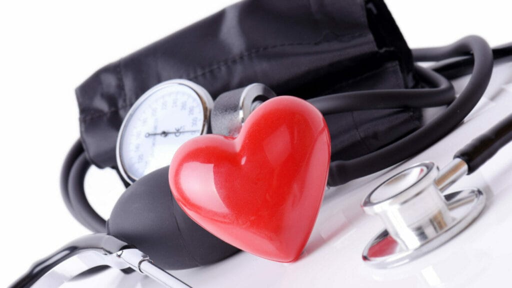 heart with blood pressure cuff and stethoscope