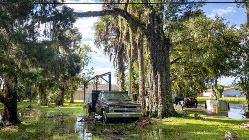 A truck covered in debris after being flooded by Hurricane Idalia in Crystal River, Florida, US, on Thursday, Aug. 31, 2023. Florida has started to dig out from the aftermath of Idalia, which weakened to a tropical storm even as it brought heavy rain across Georgia and the Carolinas, caused billions of dollars in damage, left hundreds of flights grounded and thousands without power. Photographer: Christian Monterrosa/Bloomberg via Getty Images