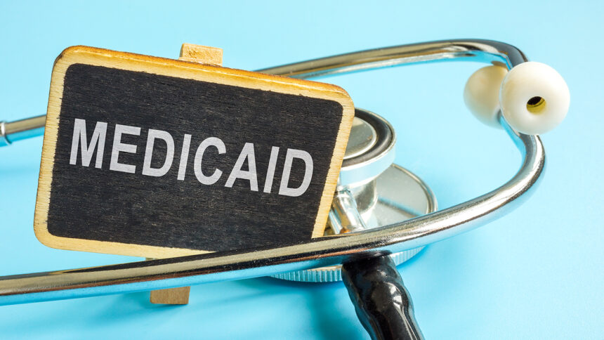 A Plate with word Medicaid and a stethoscope.