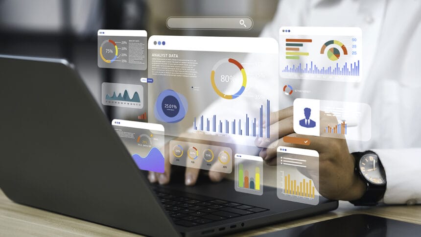 An analyst uses a computer and dashboard for data business analysis and Data Management System with KPI and metrics connected to the database for technology finance, operations, sales, marketing