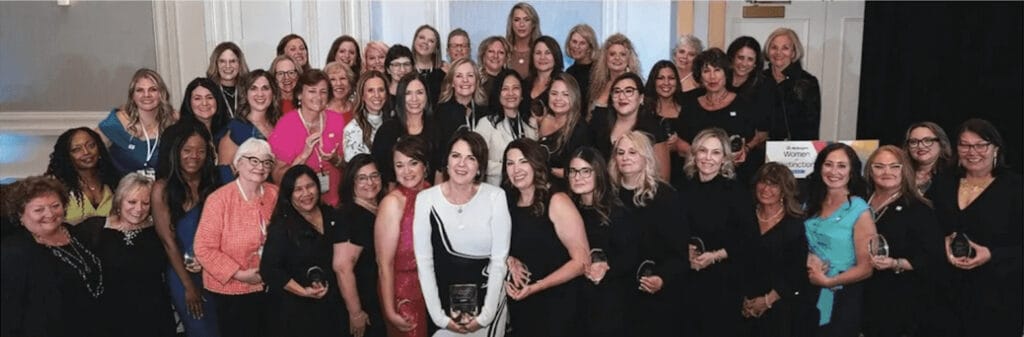 group of women posing with awards