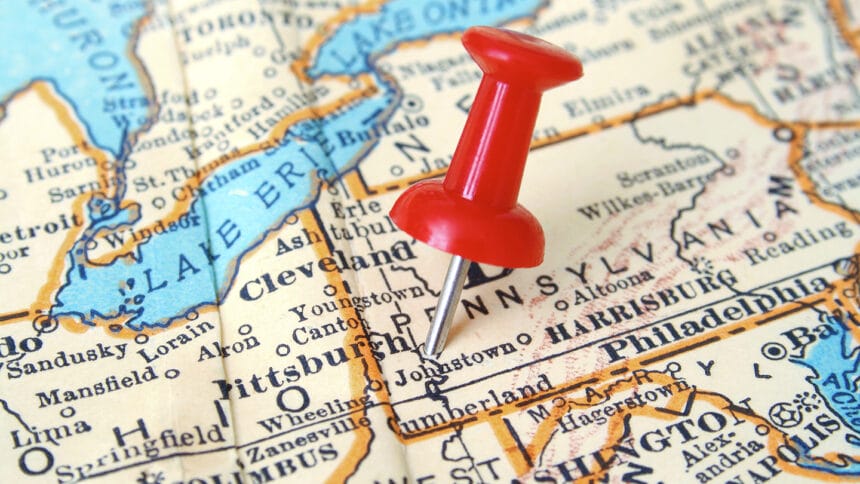 Red pushpin pointing to Pittsburgh city in more than fifty years old map