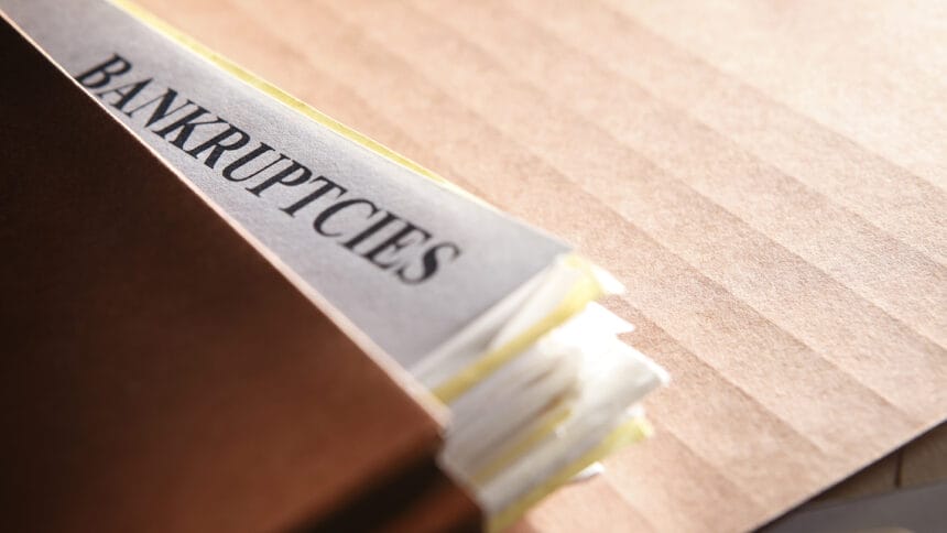 A file folder stuffed with paperwork pertaining to bankruptcy proceedings. Shot with shallow depth of field.To see more of my financial images click on the link below: