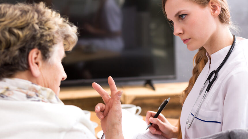 patient speaking with health professional