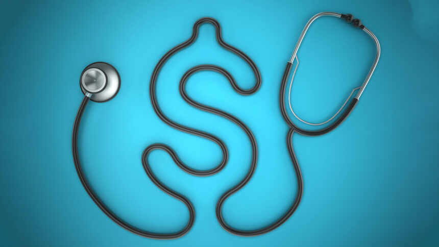 Stethoscope with dollar shaped cord standing on turquoise background. Vignette effect applied.