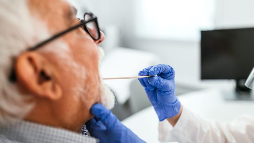 older man getting swabbed