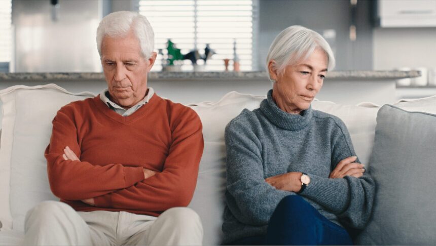 Two older adults on a couch