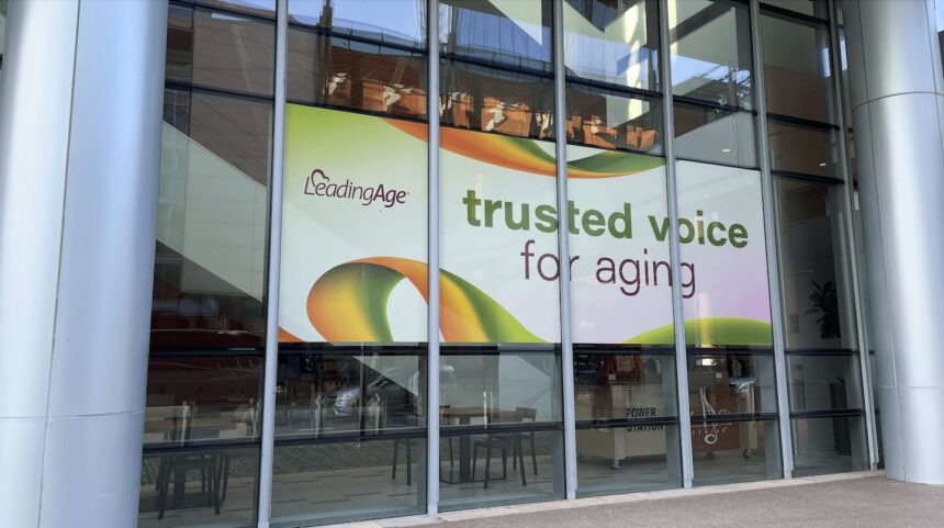 LeadingAge poster on the window of the Nashville convention center