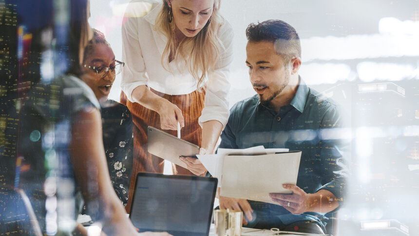 Business people working with a digital tablet in a meeting