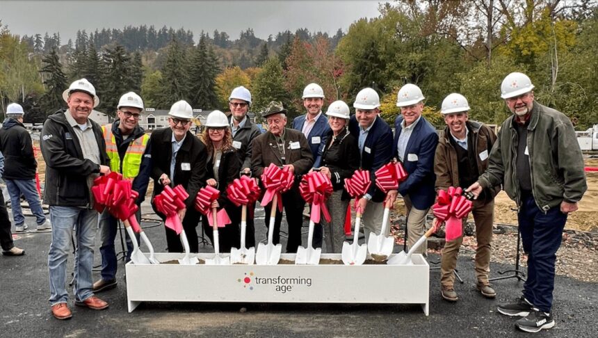 a bunch of people at a groundbreaking