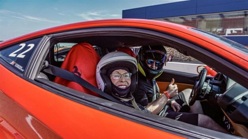 woman in Ferrari